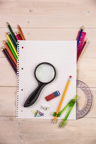 Students table with school supplies — Stock Photo, Image