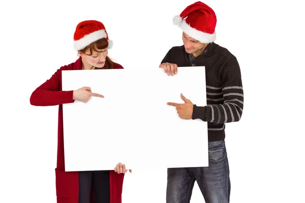 Couple holding a white sign — Stock Photo, Image