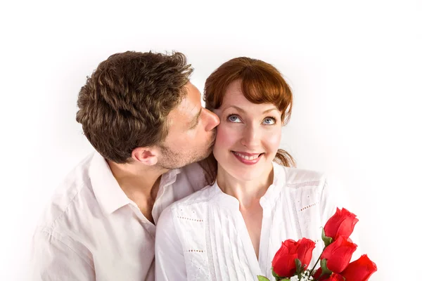Woman getting roses from man — Stock Photo, Image