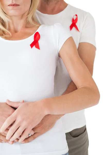 Couple supporting aids awareness together — Stock Photo, Image