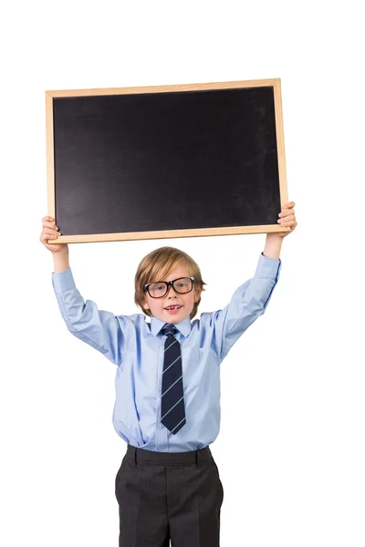 Estudante sorrindo e segurando quadro negro — Fotografia de Stock