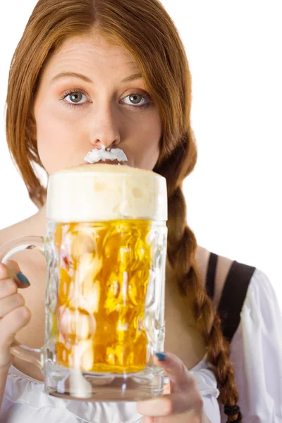 Oktoberfest girl drinking jug of beer — Stock Photo, Image