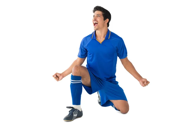 Athletic football player cheering — Stock Photo, Image