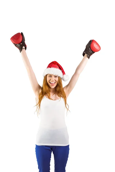 Festive redhead cheeering with boxing gloves — Stock Photo, Image