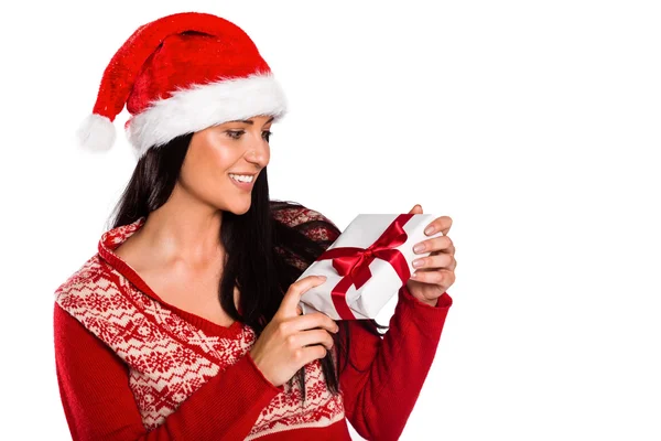 Young brunette with christmas present — Stockfoto