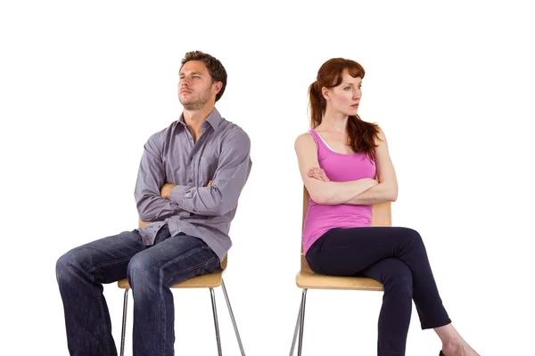 Sitting couple ignoring each other — Stock Photo, Image