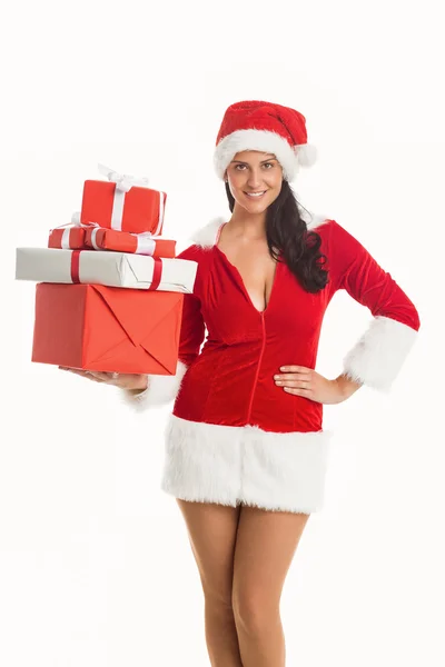 Femme souriant avec des cadeaux de Noël — Photo