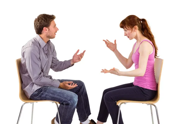 Sitting couple having an argument — Stock Photo, Image