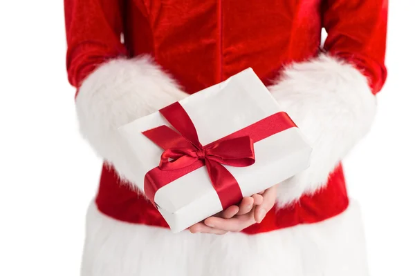 Sexy santa girl holding gift — Stock Photo, Image