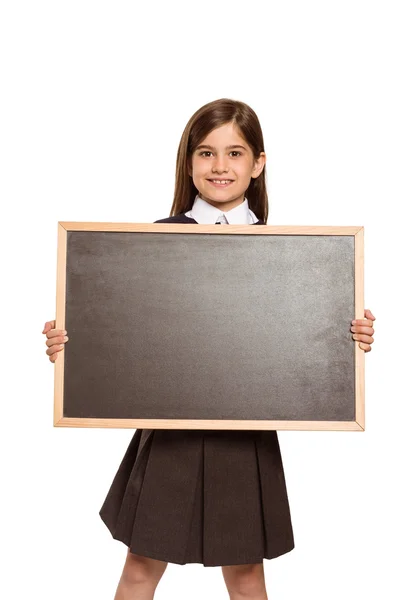 Cute pupil showing chalk board — Stock Photo, Image