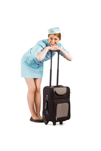 Pretty air hostess smiling at camera — Stock Photo, Image