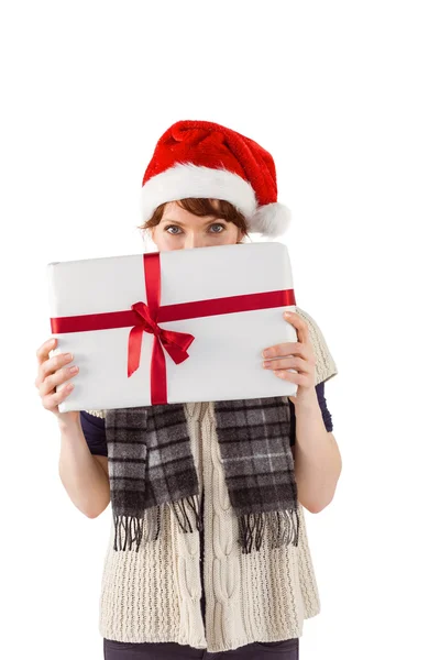 Woman holding a christmas present — Stock Photo, Image