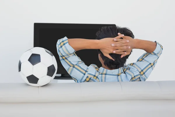 Soccer fan watching tv — Stock Photo, Image