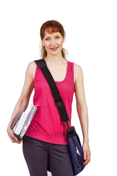 Женщина держит школьные тетради — стоковое фото