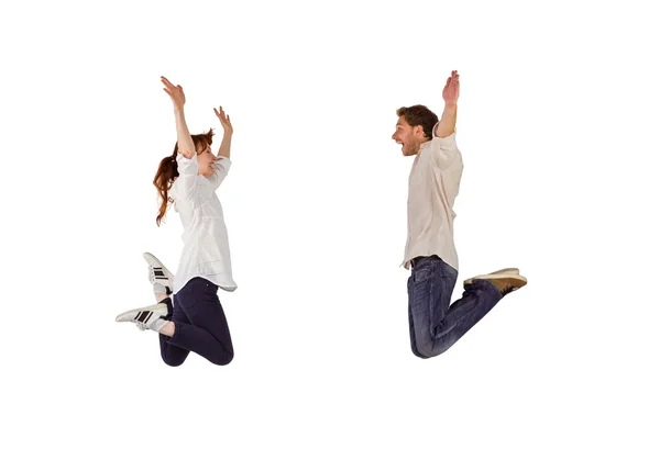 Пара прыгающих в воздух — стоковое фото