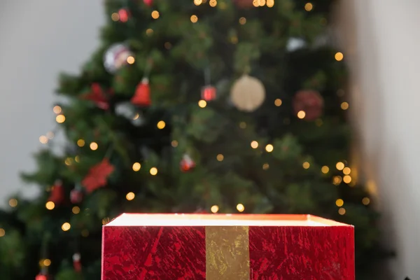 Light shining from christmas present — Stock Photo, Image