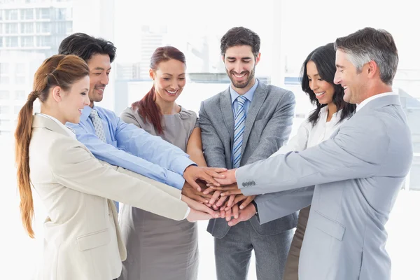 Business team stacking their hands Stock Photo