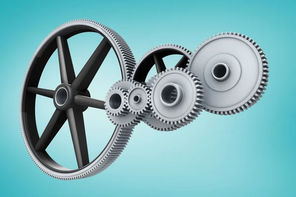 White cogs and wheels connecting — Stock Photo, Image