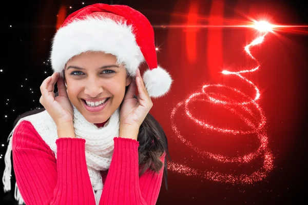 Composite image of festive brunette — Stock Photo, Image