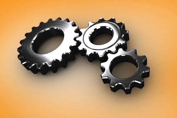 Metal cogs and wheels connecting — Stock Photo, Image