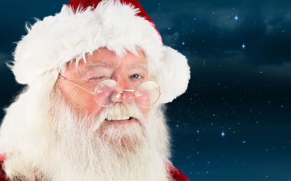 Композитное изображение подмигивания Санта-Клауса — стоковое фото