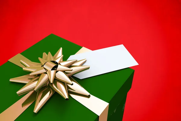 Green and gold christmas gift — Stock Photo, Image