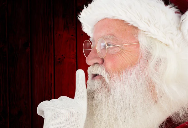 Santa claus making quiet sign — Stock Photo, Image