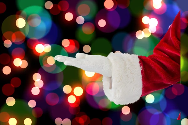 Santa Claus presenterar med hand — Stockfoto