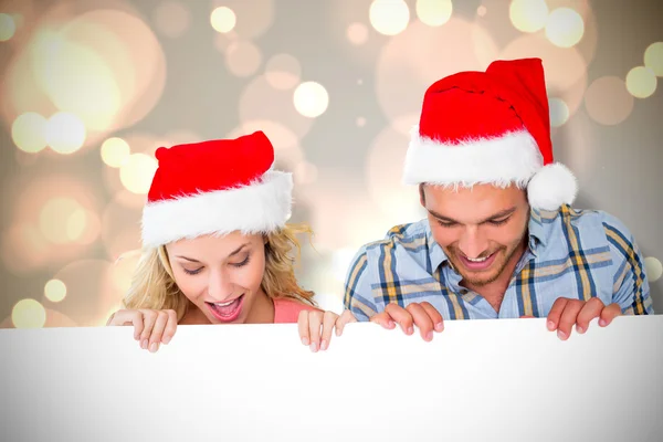 Imagem composta de jovem casal festivo — Fotografia de Stock