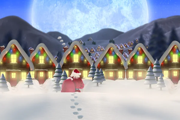 Santa wandelen in de sneeuw — Stockfoto