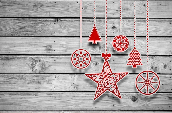 Imagem composta de pendurar decorações de Natal vermelho — Fotografia de Stock