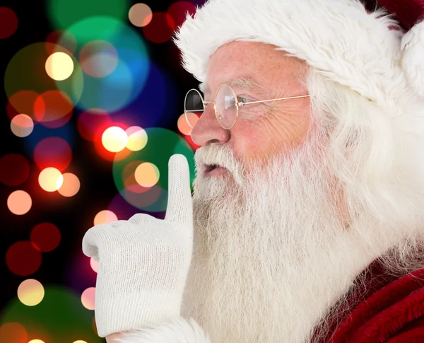 Claus santa sessiz işareti yapmak birçok parçalardan oluşan imge — Stok fotoğraf