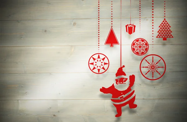Composite image of hanging red christmas decorations — Stock Photo, Image