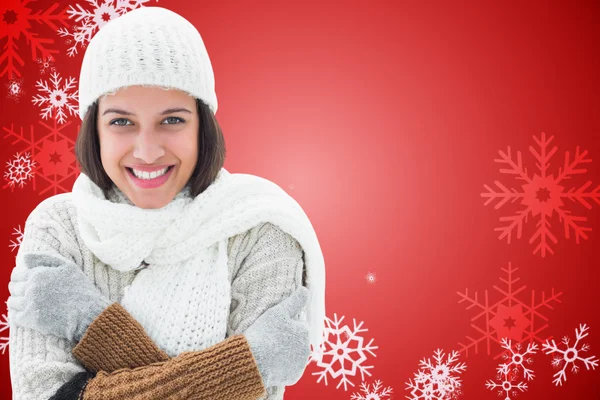 Zusammengesetztes Bild einer Brünetten in warmer Kleidung — Stockfoto