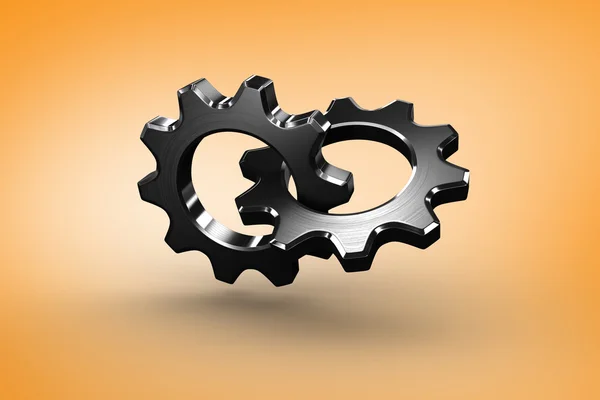 Metal cogs and wheels connecting — Stock Photo, Image