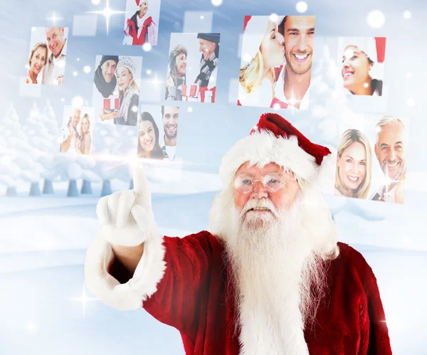 サンタ クリスマスのコラージュの人々 を指しています。 — ストック写真