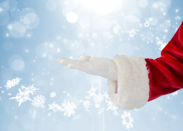 Papai Noel apresentando com a mão — Fotografia de Stock