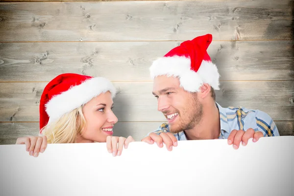 Imagem composta de jovem casal festivo — Fotografia de Stock