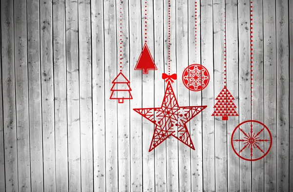 Composite image of hanging red christmas decorations — Stock Photo, Image