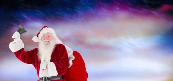 Složený obraz santa Claus zvoní zvonek — Stock fotografie