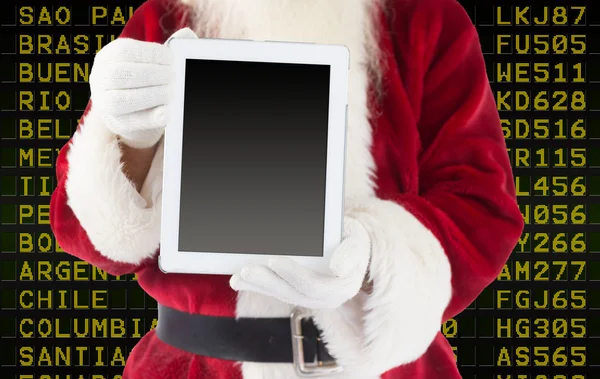 Santa Claus showing tablet PC — Stock Photo, Image