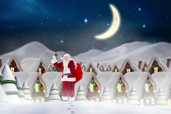 Imagem composta de Papai Noel andando na neve — Fotografia de Stock