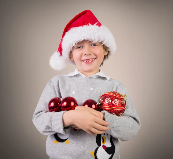 Imagen compuesta de niño festivo sonriendo —  Fotos de Stock