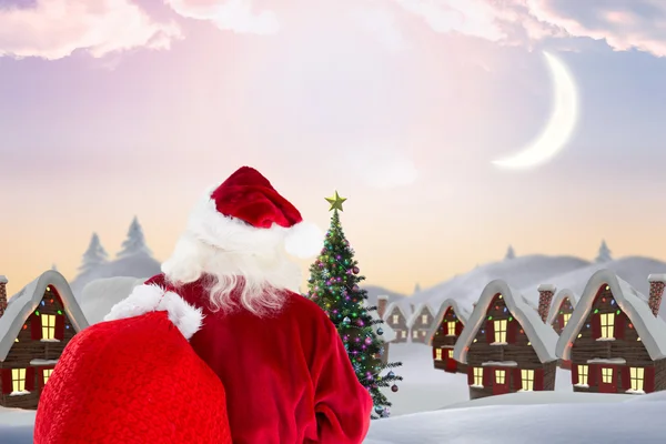 Image composite de Santa Claus portant le sac — Photo