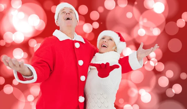 Samengestelde afbeelding van feestelijke ouder paar — Stockfoto