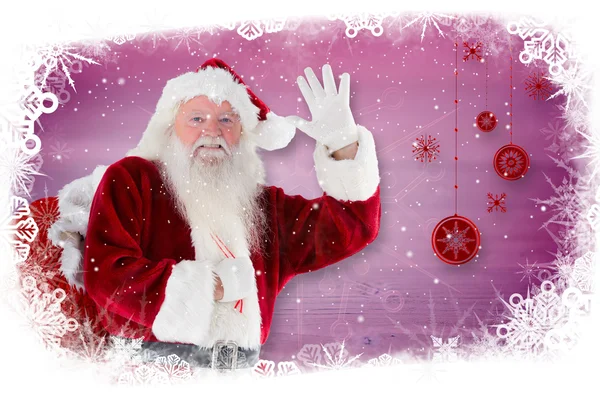 Imagen compuesta de Santa Claus saludando — Foto de Stock