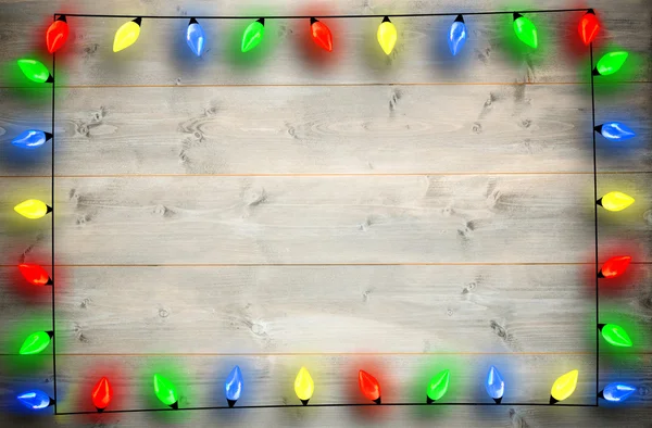 Imagen compuesta de luces de Navidad en una línea —  Fotos de Stock