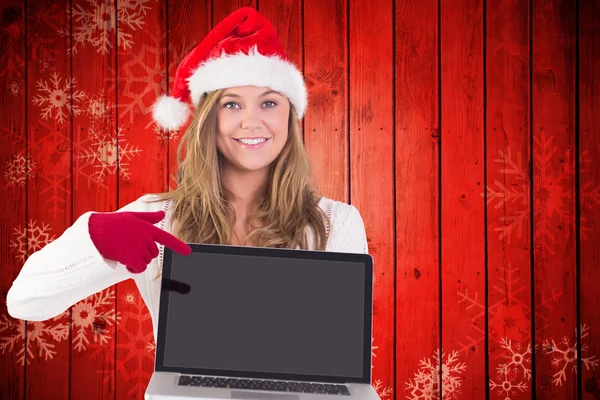 Image composite de blonde festive montrant un ordinateur portable — Photo