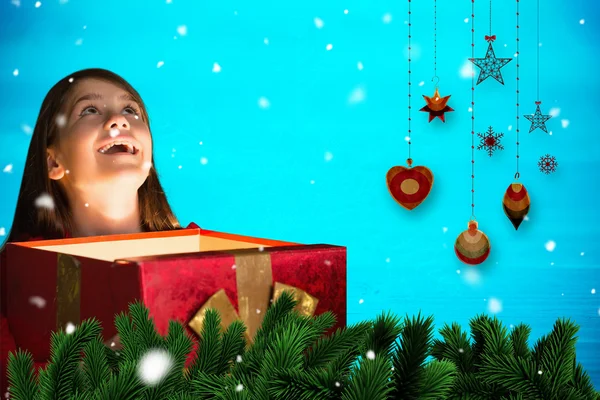 Happy girl opening gift box — Stock Photo, Image