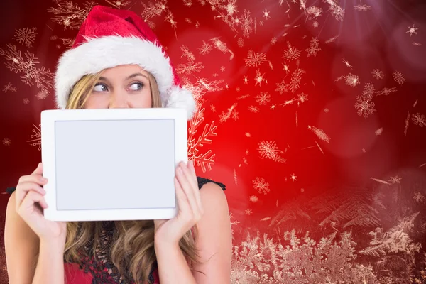 Festive blonde showing a tablet — Stock Photo, Image